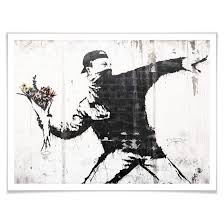 He produces pieces of work which pop up in public places, such as on the walls of buildings. Poster Banksy Der Blumenwerfer Wall Art De