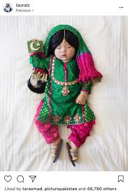A Japanese Mother Dresses Up Her Daughter In Pakistani Traditional Dress And Pakistani Flag In Her Hand Upon A Newborn Costume Baby Girl Clothes Girl Outfits