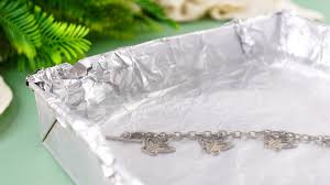 If your silver necklace is only mildly tarnished, you can start by using a bit of dish soap. 3 Ways To Clean Sterling Silver With Baking Soda And Aluminum