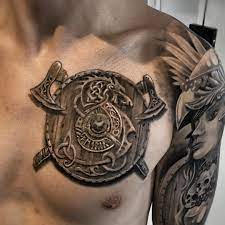 Although the shield tattoo is not considered to be a main stream tattoo design, there still is a popularity for the. Tattoo Models A Shield On The Chest Chest Tattoos For Women Cool Chest Tattoos Shield Tattoo