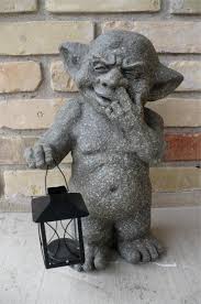 There is no clear information of who first designed one. Ogre Gargoyle Statue With Lantern Figure Garden Picking Nose Ornament Figurine Ebay Gargoyle Statue Gargoyles Ogre