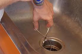 how to unclog a garbage disposal