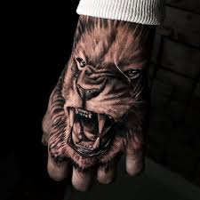 Top 100 De Tatouages Lions Pour Homme Tatouez Comme La Setting Manhattan Project Planete Tattoo Est El Lion Head Tattoos Lion Hand Tattoo Lion Tattoo