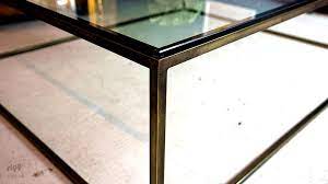 Brass + glass + mirror + right proportions = one very lovely coffee table. Brass And Glass Coffee Table