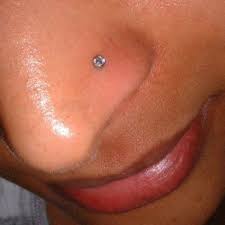 What's the best way to put a ring on a corkscrew? Nose Piercing Healing Issues Tatring