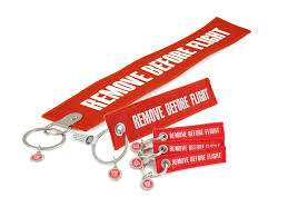 Remove before flight is a safety warning often seen on removable aircraft and spacecraft components, typically in the form of a red ribbon, to indicate that a device, such as a protective cover or a pin to prevent the movement of mechanical parts, is only used when the aircraft is on the ground (parked or taxiing). 5 Anhanger Im Set Remove Before Flight Alle Grossen Von Mini Bis Jumbo Xxl Rbf Originals