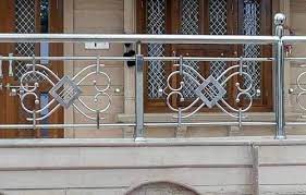 Brushed metal surface with water drops. Stainless Steel Design Glass Balcony Stainless Steel Designer Balcony Manufacturer From Chennai
