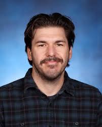 Ghosted Background Eagle- Meet the Staff