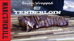 Wrapping the lean pork with bacon helps flavor the meat and keeps it from drying out. Bacon Wrapped Tenderloin On The Traeger Delicious Recipe Youtube