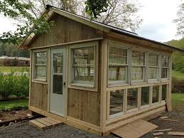 This diy greenhouse made from old windows is a very interesting design. 15 Fabulous Greenhouses Made From Old Windows Off Grid World