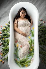 Milk is a natural cleanser. Milk Bath Maternity Photoshoot Dallas Photographer Lindsay Walden