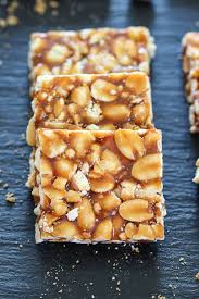 Fried gram chikki recipe is a wholesome snack that is made from the goodness of peanuts and fried gram dal making it a high protein snack. Peanut Chikki How To Make Peanut Brittle Or Peanut Gajak
