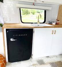 Feel like your kitchen could do with a lift? Oh My Meet Lulu The Stunning Caravan Metro Blanco Tiles Have Been Used To Create A Minimal Yet Sophisticated Splashb Splashback Caravan Decor Smart Tiles