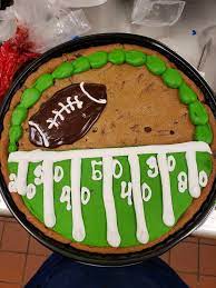 Fall cookies cookie cake decorations diy cake decorating cookie cake designs halloween desserts halloween cakes sparkle cake giant chocolate chip. Football Cookie Cake Cookie Cake Designs Big Cookie Cupcake Cakes