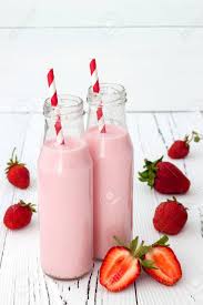 Download Strawberry Milk In Traditional Glass Bottles With Straws On Old Stock Photo Picture And Royalty Free Image Image 42651636 PSD Mockup Templates