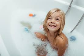 Yet this common parenting ritual often comes with questions, and sometimes anxiety, about when and how to do it well. Happy Naked Child Taking Bath With Bath Foam At Home Free Stock Photo And Image