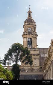 Clock tower of the Cathedral of Saint Agatha in Catania, Sicily, Italy  Stock Photo