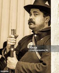 Confederate Civil War Reenactors On The March In Sepia Stock Photo