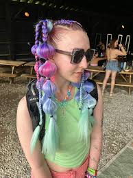 Braiding services at Nocturnal Wonderland Camping 2025