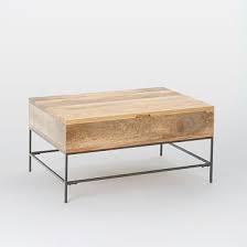This Solid Wood Coffee Table Adds Industrial Style And Storage To Your Space In One West Elm Coffee Table Coffee Table With Storage Reclaimed Wood Coffee Table
