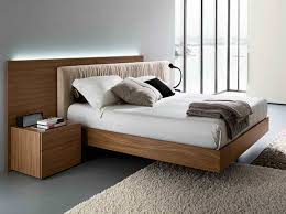The handy living platform bed frame is a common type you'll find at many retailers and sites, with curved wooden slats nested in rubber holders hammered into the metal frame. Top 7 Best Bed Frames For The Modern Bedroom A Very Cozy Home Bed Design Modern Bedroom Bed Design Modern