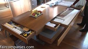 Compact Apartment With Folding Walls And Tons Of Hidden Storage Video Dining Table With Storage Small Apartment Living Room Small Apartment Living
