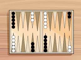3 roll a die to determine who goes first. How To Play Backgammon With Pictures Wikihow