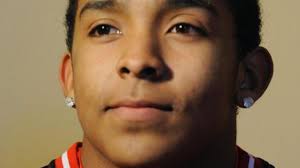 Boy saves woman in icy pond