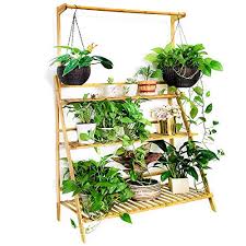 A 3 tier hanging planter that's perfect for trailing plants, you'll want this piece giving your garden a boost. Moutik Bamboo Flower Display Stand Plants Pots 3 Tier With Hanging Planter Folding Shelving Organizer Storage Shelves Rack Unit Holder 39 3in Buy Online In Cayman Islands At Cayman Desertcart Com Productid 88229475