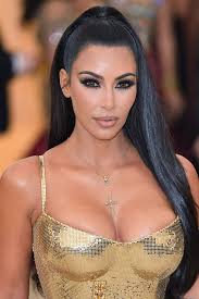 Kardashian west looked like liquid gold in her custom chainmail versace dress featuring crosses embroidered on the bodice and hip. How To Recreate Kim Kardashian S Met Gala Look Beauty Crew