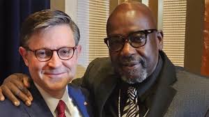 Appeals Court Hears Case of Pastor Removed from Board for Beliefs