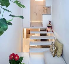 These colors help create an open and expansive feeling. Setting Up Small Apartment Use The Room Height And Save Space Interior Design Ideas Avso Org