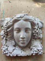 20 odd years ago I found her in Value Village spray painted with this awful  pink spackle textured stuff. The end of the night she was revealed after a  soak in the