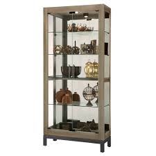 Beaming with handcrafted pride, this curio cabinet features a light with five glass shelves and one sliding glass door to proudly display and protects your most prized items. Quinn V Curio Cabinet 680682 Howard Miller