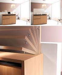 Mini kitchens designed along a wall or freestanding with or without upper cabinets and can be performing as a partition between a living area and kitchen area. Compact Kitchenette Cools Cooks Cleans Designs Ideas On Dornob
