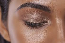 glowing skin and light brown eyeshadow