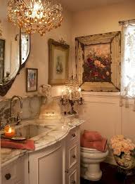 An upholstered chair, antique candlesticks, and a gilded mirror over the fireplace add some french glam. 50 Interesting Shabby Chic Bathroom Decor Ideas Bathroom Bathroomdecor Ba Country Bathroom Decor French Country Decorating Bathroom French Country Bathroom