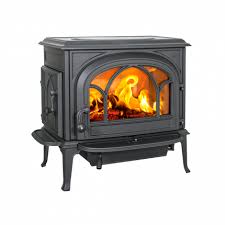Finished to a very high standard in black, with a front cover that conceals the door handles Jotul Scandinavian Cast Iron Wood Stoves Modern Or Traditional Design