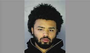 A shooter in fatal gunfight outside Target says he returned shots while  running away, records say (UPDATE)