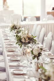 Reception Table Centre Piece Spring Flowers Long Table Vase Of White Flowers Vineyard Weddin Wedding Table Centres Long Table Wedding Wedding Table Flowers