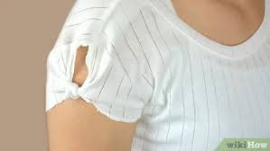 Stretch out the edges where you just cut by grabbing either side and pulling. 5 Ways To Cut A Shirt Wikihow