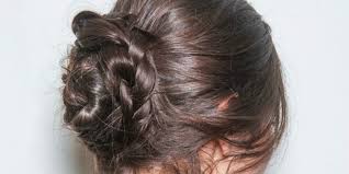 Tuck the end of the ponytail under the bun, and hold it securely. How To Make A Braided Bun Easy Braided Hairstyle In Less Than 60 Seconds