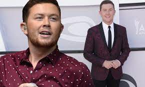 Scotty McCreery talks after bringing loaded gun to airport | Daily Mail  Online