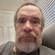 What could be causing the air conditioner in my RV to leak when it rains  and is turned on?