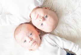 Remember those sweet twins I photographed in October? They are 3 months old  now! Growing so fast, filling out some 6 month clothes, and have beautiful  baby blues!