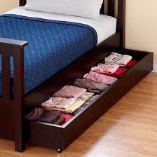 These are a pair of beds that work in conjunction with one. Trundle Without The Mattress Can Be Used For Storage Trundle Bed Cheap Bedding Sets Bed