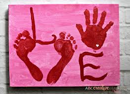 Valentine S Day Kids Handprint And Footprint Craft Valentine's day card templates by canva. kids handprint and footprint craft