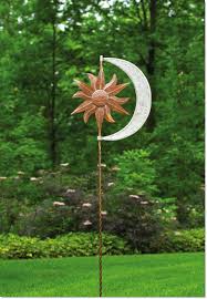 Pin By Deanna Fountain On Yard Art Object Sculpture Up Cycled Discarded Items Clay Sculptures Painted Junk This And That Garden Spinners Kinetic Spinner Wind Sculptures