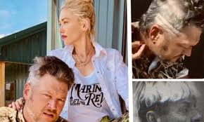 Official blake shelton website for new music, videos, tour updates, official merchandise, and more! Gwen Stefani Gives Blake Shelton A Mullet And Fans Compare It To Tiger King Joe Exotic S Hair Daily Mail Online