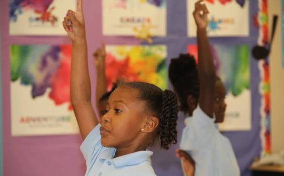 Girl raising hand